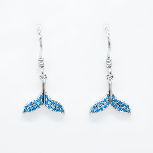 A pair of sterling silver whale tail drop earrings embellished with small blue topaz gemstones, 925 sterling silver