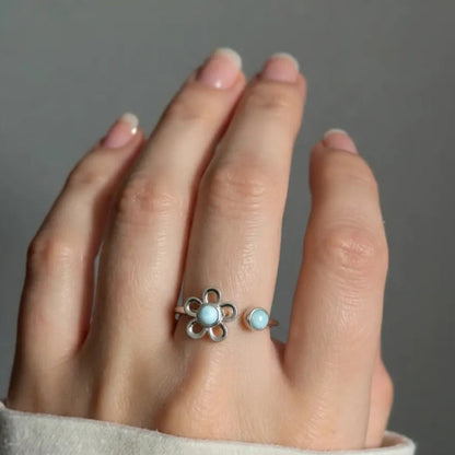 Rotating-Flower-Spinner-Ring-on-Hand-Larimar-Gemstone-Stress-Relief-Jewelry